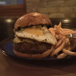 a burger and fries on a plate