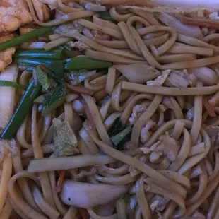 a plate of noodles and vegetables