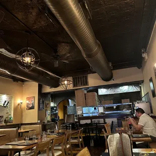 a man sitting at a table in a restaurant