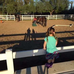 Waiting impatiently for her turn!