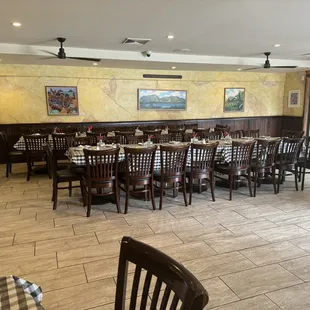 Dining area setup for a large party gathering.