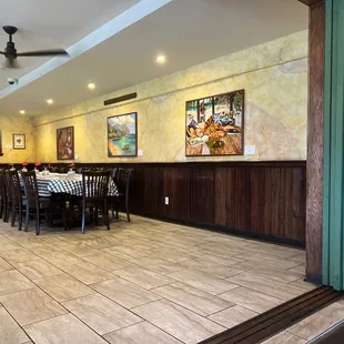 One side of the dining area setup for a large group (22 top).