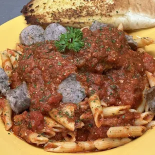 Penne pasta with Italian sausage and meatballs