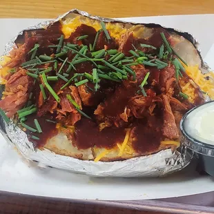 Ham loaded potato, delicious but really need a better chop on these chives.