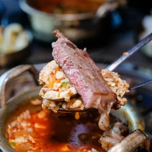 Warm up with our rich, savory tofu soup at Ziggle KBBQ! Packed with flavor and the perfect comfort dish.