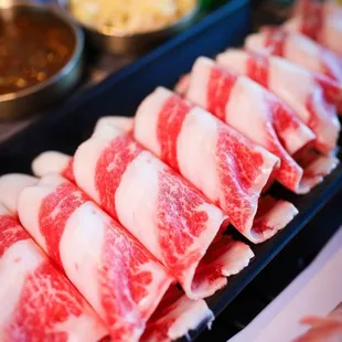 Ziggle KBBQ serves up tender and flavorful beef belly that&apos;s a must-try for BBQ lovers.