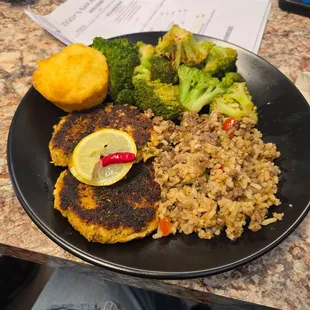 Crab cakes with dirty rice and brocholi