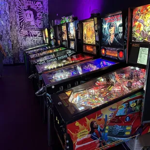 a row of pinball machines