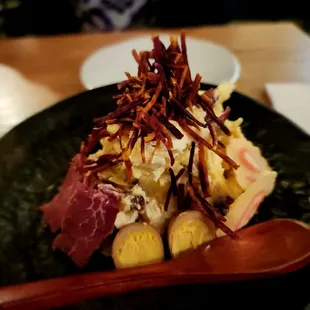 Sweet potato salad. The quail eggs and pipikaula make it outstanding!