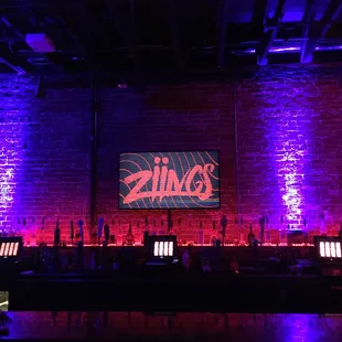 a bar with purple lighting
