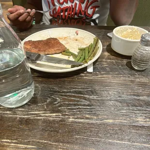 Steak and green beans with grits