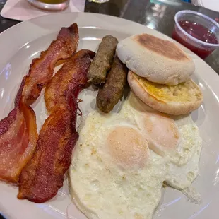 #3 Combo - 2 eggs + your choice of bread ($6.95), add side of sausage ($2) , add side of bacon ($2)
