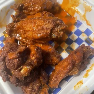 chicken wings in a styrofoam container