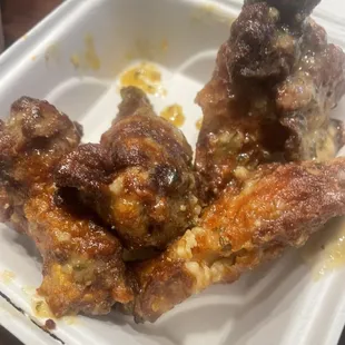 chicken wings in a styrofoam container