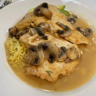 Chicken Marsala with rice and veggies. Perfectly cook and the sauce is so yummy!