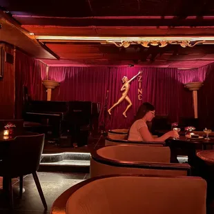 a woman sitting at a table