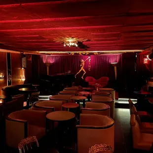 a woman dancing in the middle of the room