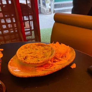 "Chips" and guacamole. (crumbs and guacamole)