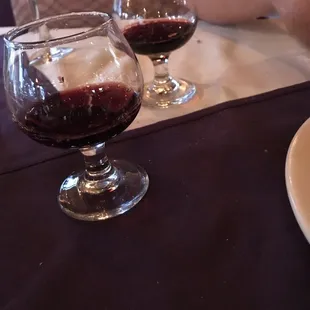 Red wine our waiter brought to us to have with dessert. He did this to enhance the dessert and really made us appreciate this place.