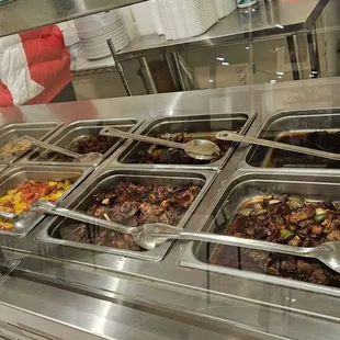 a buffet with a variety of food items