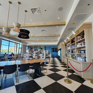 a black and white checkered floor in a restaurant