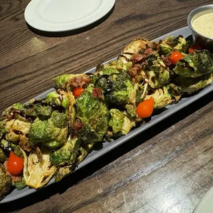 Brussels Sprouts with Shishito, Bacon, Tomato and Balsamic Vinagrette