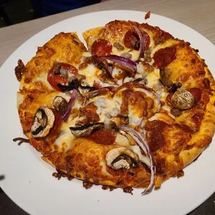 Pizza.  Shrooms, pepps, red onions.