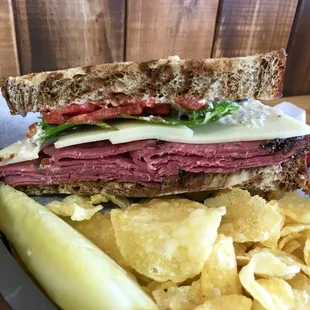 A pastrami and Swiss sandwich.