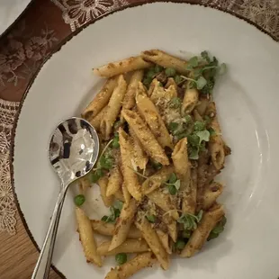 a plate of pasta on a table