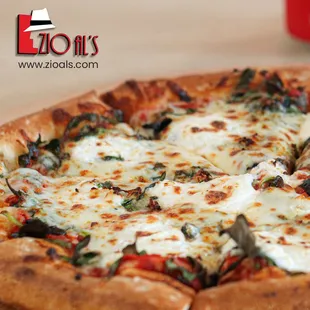 a close up of a pizza