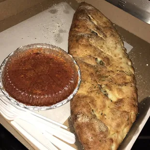 Cheese steak Stromboli..... I love how they put the sauce on the side.