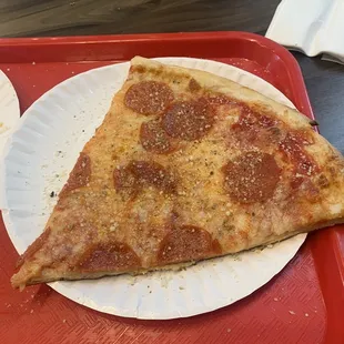 a slice of pepperoni pizza