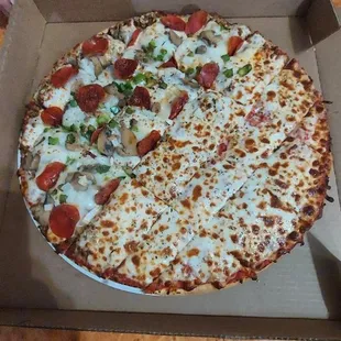 Elvis is alive and doing fine. What a Delight to find this Place. Pizza was amazing, we did a half and half and they got it right down the m