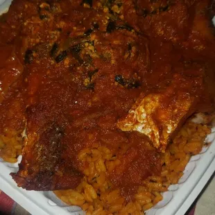 a plate of chicken and rice