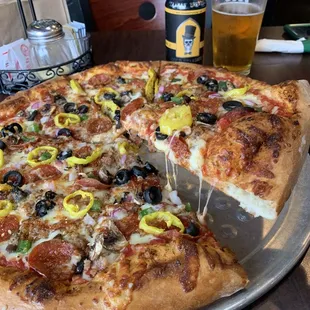 Deluxe Pizza. Delicious.