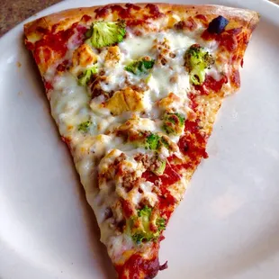 Broccoli, chicken, sausage and sundried tomatoes! I love the 4 toppings for the price of 3 special!