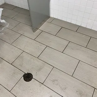 Overflowing toilet with water all over the floor