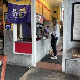 a woman ordering food