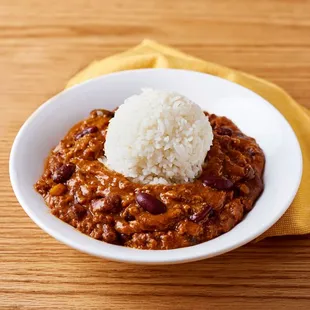 a bowl of chili and rice