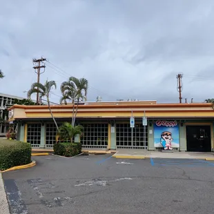 View from the parking lot - entrance is on the right of the mural