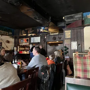 a group of people sitting at a table