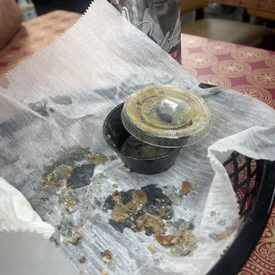 a half eaten meal on a tray