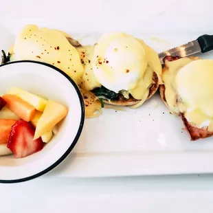 Benedict flight with fruit cup