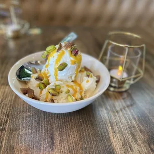 a bowl of ice cream and nuts