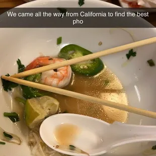 wo bowls of soup with chopsticks