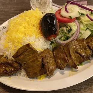 a plate of meat and rice