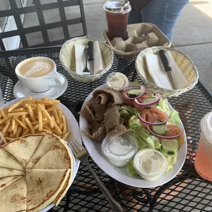 Gyro plate with a side of fries and pita. Drinks from the coffee shop next door.