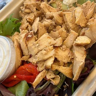 a chicken salad in a styrofoam container