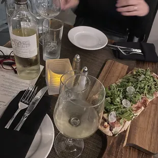  a woman sitting at a table