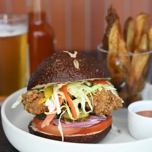 Fried Chicken and Slaw on a Firebrand Pretzel Bun with a Side of Fries